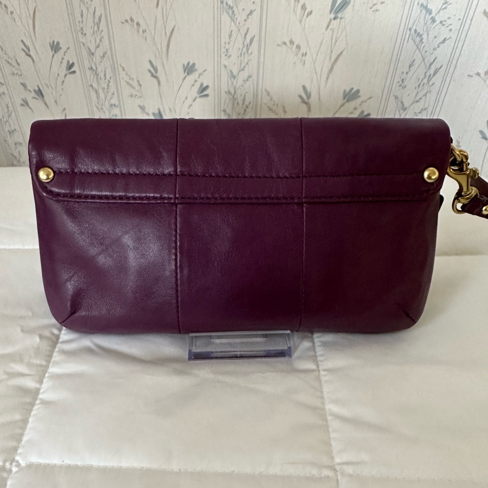 Coach Plum Leather Wristlet with Gold Accents - Picture 4 of 13